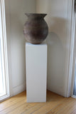 ANTIQUE VESSEL ON WHITE MUSEUM PLINTH