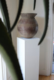 ANTIQUE VESSEL ON WHITE MUSEUM PLINTH